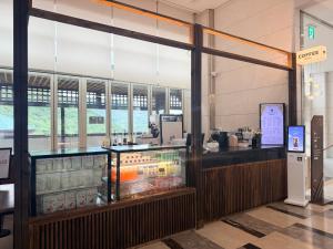 a food court with a counter in a building at STX Resort in Mungyeong +24 photos