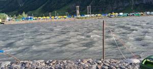 a large body of water with ice on it at Gurez valley camping site in Gurais