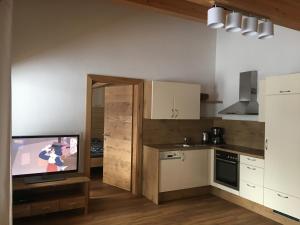 Kuchyňa alebo kuchynka v ubytovaní Appartement Mühlhäusl