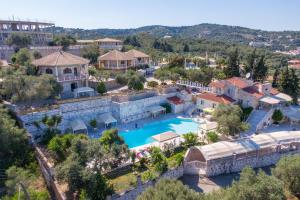 an aerial view of a resort with a swimming pool at Paco's Resort Standard Studio 1 in Oziás