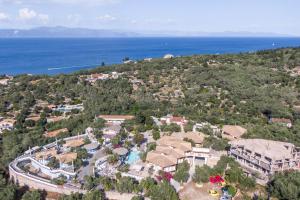 an aerial view of a resort with the ocean at Paco's Resort Superior Villa 7 in Oziás