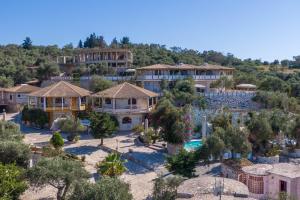 an aerial view of a resort with a swimming pool at Paco's Resort Standard Studio 2 in Oziás