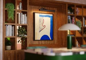 a picture of a painting on a wall in a library at The July - Capel Street in Dublin