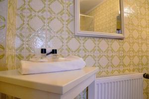a bathroom with a sink and a mirror at Hotel Rosenhof - Braunlage in Braunlage +22 photos