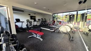 a gym with chairs and equipment in a room at Asmara Residence 2 Bedroom Apartment by LOV Mauritius, Beach Access in Petite Case Noyale