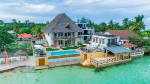 an aerial view of a house in the water at NEST in pongwe in Mdudu Mdogo