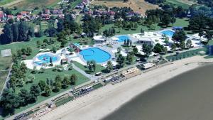 an aerial view of a resort with a pool at Studio apartman ANNI, Self CHECK-IN in Osijek