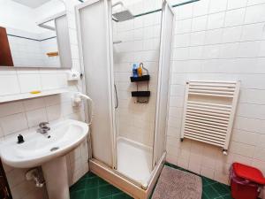 a bathroom with a sink and a shower at Nightstars B&B in Mestre +30 photos