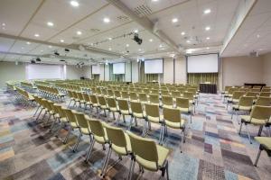 an empty room with rows of chairs in a lecture hall at Scandic Sørlandet in Kristiansand +38 photos