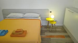 Postel nebo postele na pokoji v ubytování Ca'cita Guest House Torino