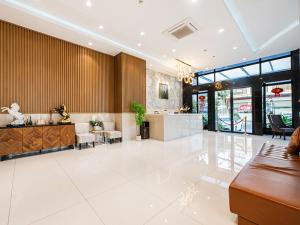 a lobby with a waiting area and a lobby at H Resident in Phnom Penh +61 photos