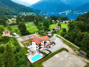 an aerial view of a house with a swimming pool at Maso dell Apicoltore in Ledro