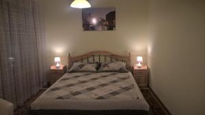 Postel nebo postele na pokoji v ubytování Pongrácz Apartman