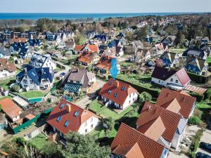 an aerial view of a small village with houses at Rauchschwalbe in Zingst