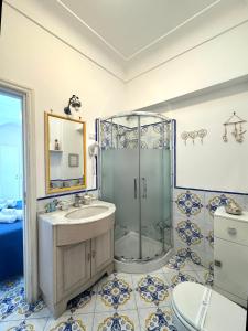 a bathroom with a shower and a sink at B&B Villa Cristina in Anacapri