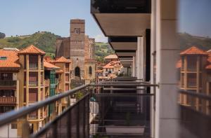 a view of a city from a balcony at Ardantza Bidea - baskeyrentals in Zumaia