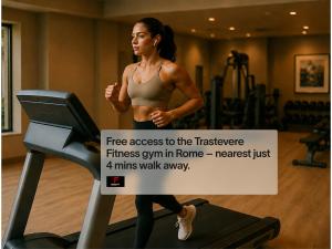 a woman running on a treadmill with a sign at Numa Rome Trastevere in Rome