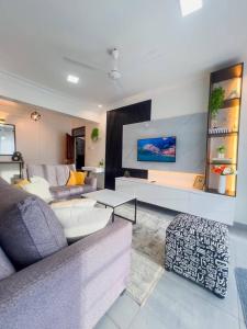 a living room with a couch and a table at The palace001 in Mombasa