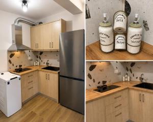 a kitchen with wooden cabinets and a stainless steel refrigerator at Melody's Room in Borsh
