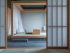 a view of a room through a glass door at hotel kanra kyoto in Kyoto