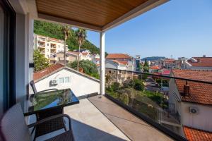 a balcony with a view of a city at Premium Apartments Zevs in Budva