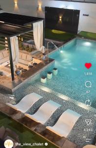 a pool at the view shingle hotel suites at THE VIEW chalet in Makhrabā