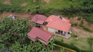 an aerial view of a house with red roofs at WYCLIFF BnB in Chabahinga