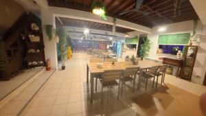 a dining room with a table and chairs at Feelgood dive resort in Basbas