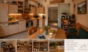a kitchen with white cabinets and a wooden table at Zuhause am Bach Ruhige Unterkunft für Erholungssuchende am Welterbesteig und Donauradweg in Aggsbach
