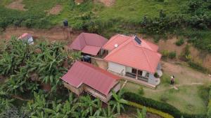 an aerial view of a house with red roofs at WYCLIFF BnB in Chabahinga