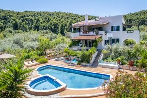 an image of a villa with a swimming pool at Nature Grand Estate - Spacious Villa with Pool in Skopelos Town