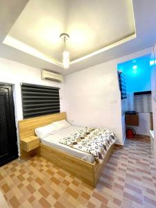 a bedroom with a bed in a room at The Hideout in Lagos