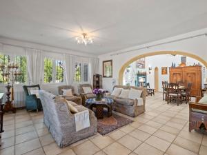 a large living room with couches and a table at Holiday Home Mirada al Sol by Interhome in Moraira +31 photos