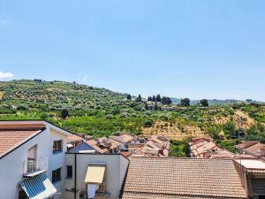 a view of the roofs of a village at Holiday Home SinAgo by Interhome in Lascari