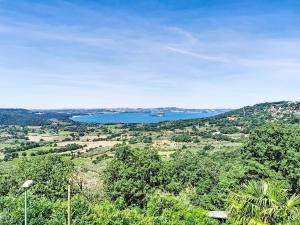 a view of a body of water from a hill at Holiday Home Casa Martina by Interhome in Montefiascone