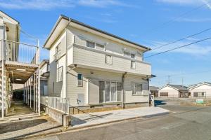 an older house on the side of a street at Third Place Villa KISARAZU in Kisarazu