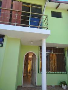 a view of the outside of a house with a staircase at Casa independiente de 2 pisos con 03 cuartos in Morales