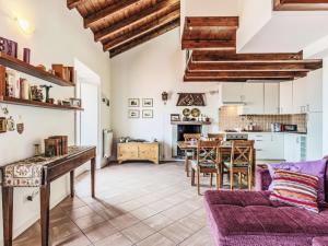 a living room with a couch and a table at Apartment Laghina by Interhome in Musso