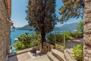 a view of the water from a building at Step to Kotor bay Perast in Perast