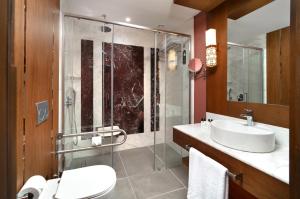 a bathroom with a sink and a shower at Aspera Hotel Taksim in Istanbul +45 photos