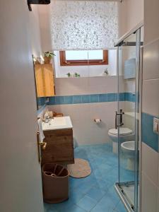 a bathroom with a sink and a toilet at Casa Villani in Agerola +41 photos