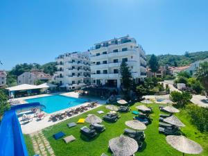 an aerial view of a resort with a swimming pool and umbrellas at Sayar Apart in Marmaris
