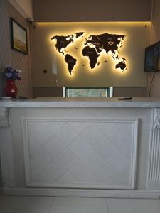 a map of the world on a wall at Gandan Peace Guest House in Ulaanbaatar +15 photos