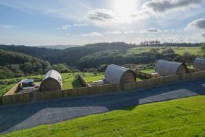 an aerial view of a house with domed roofs at Rivendell Farm Glamping in Carmarthen