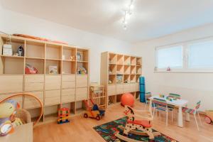 a childs play room with toys in it at Chalet SOLYMONT by MoniCare in Seefeld in Tirol