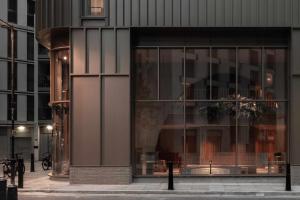 a store front of a building with a large window at Buckle Street Studios by Locke, Aldgate in London