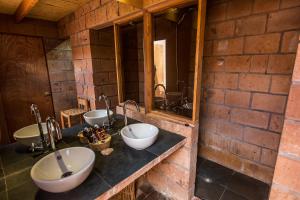 Ett badrum på Eco-Lodge El Andinista