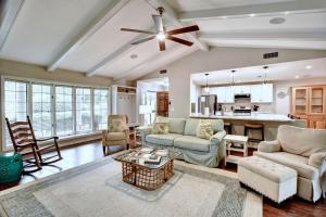 a living room with a couch and a table at 106 Shore Rush Trail in Blackbanks