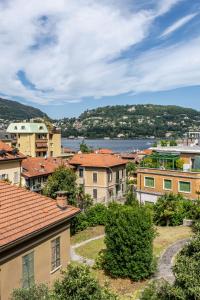 a view of a city with buildings at Hotel Quarcino in Como