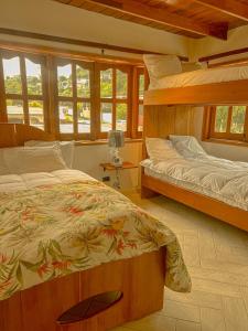 a bedroom with two bunk beds in a house at Casa Úrsula in Panama City
